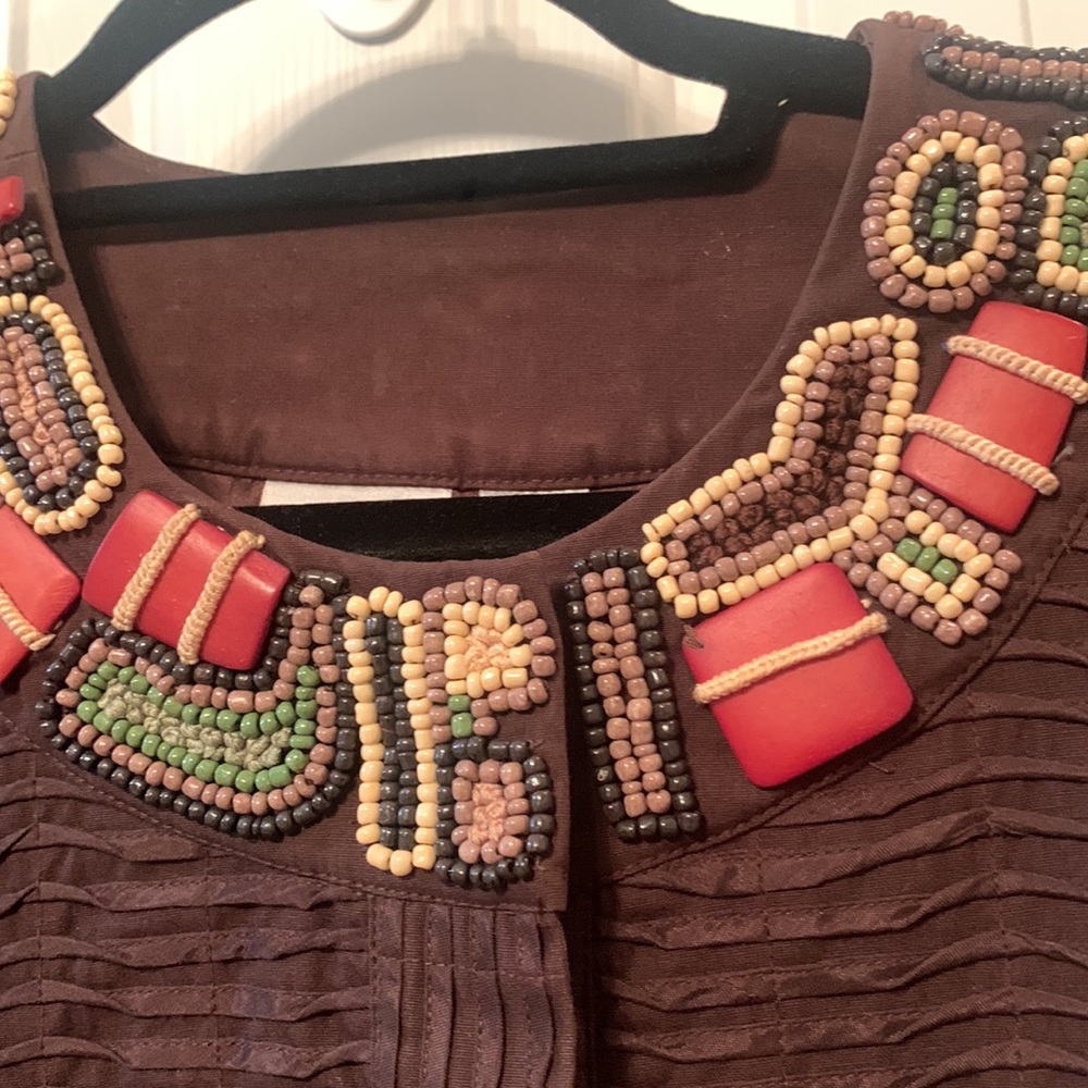 Wooden accent neckline jacket